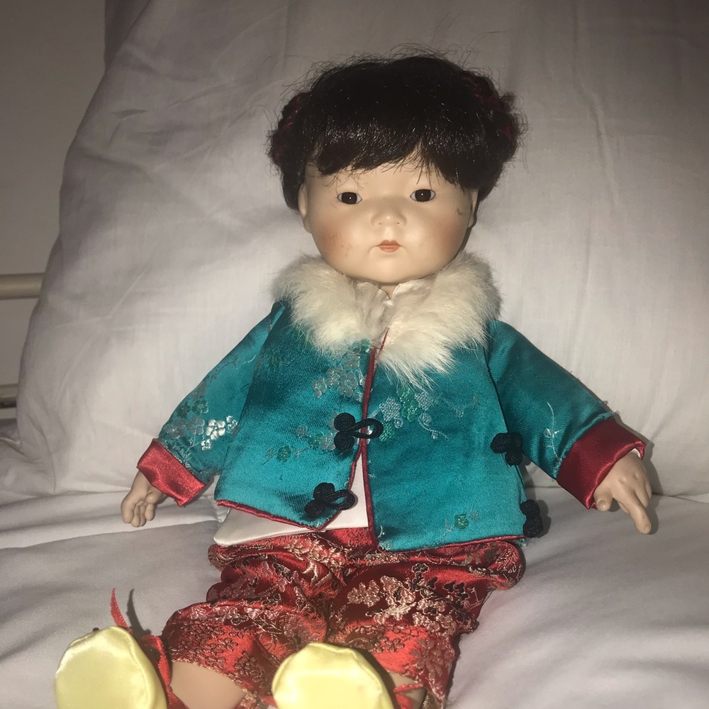 Collectible numbered doll by Marian yu designs